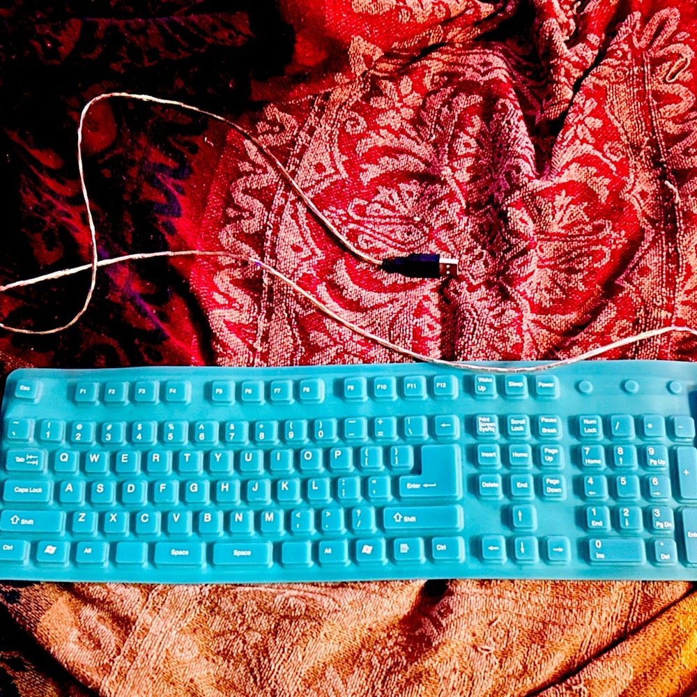 Silicone keyboard turquoise in color works great